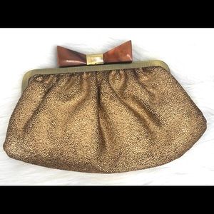 Sondra Roberts metallic gold crackled clutch with detachable chain. NWOT